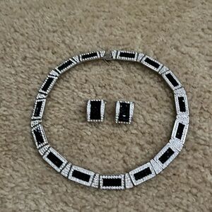 Black and rhinestone choker and clip on earrings.
